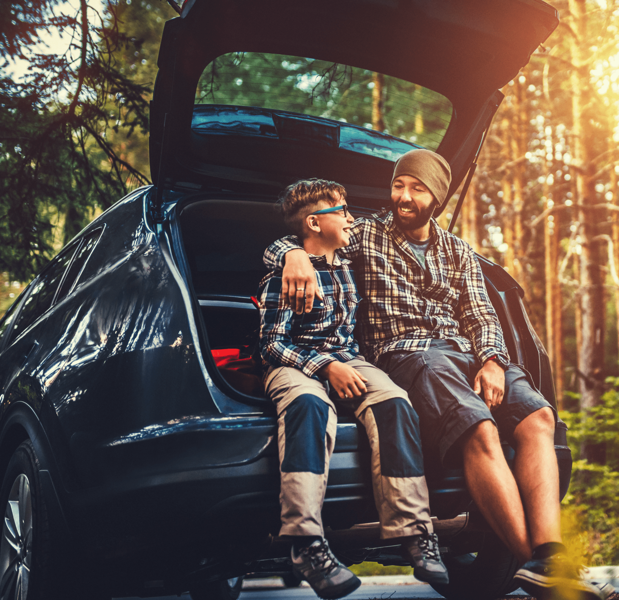 Father and son travelling by car